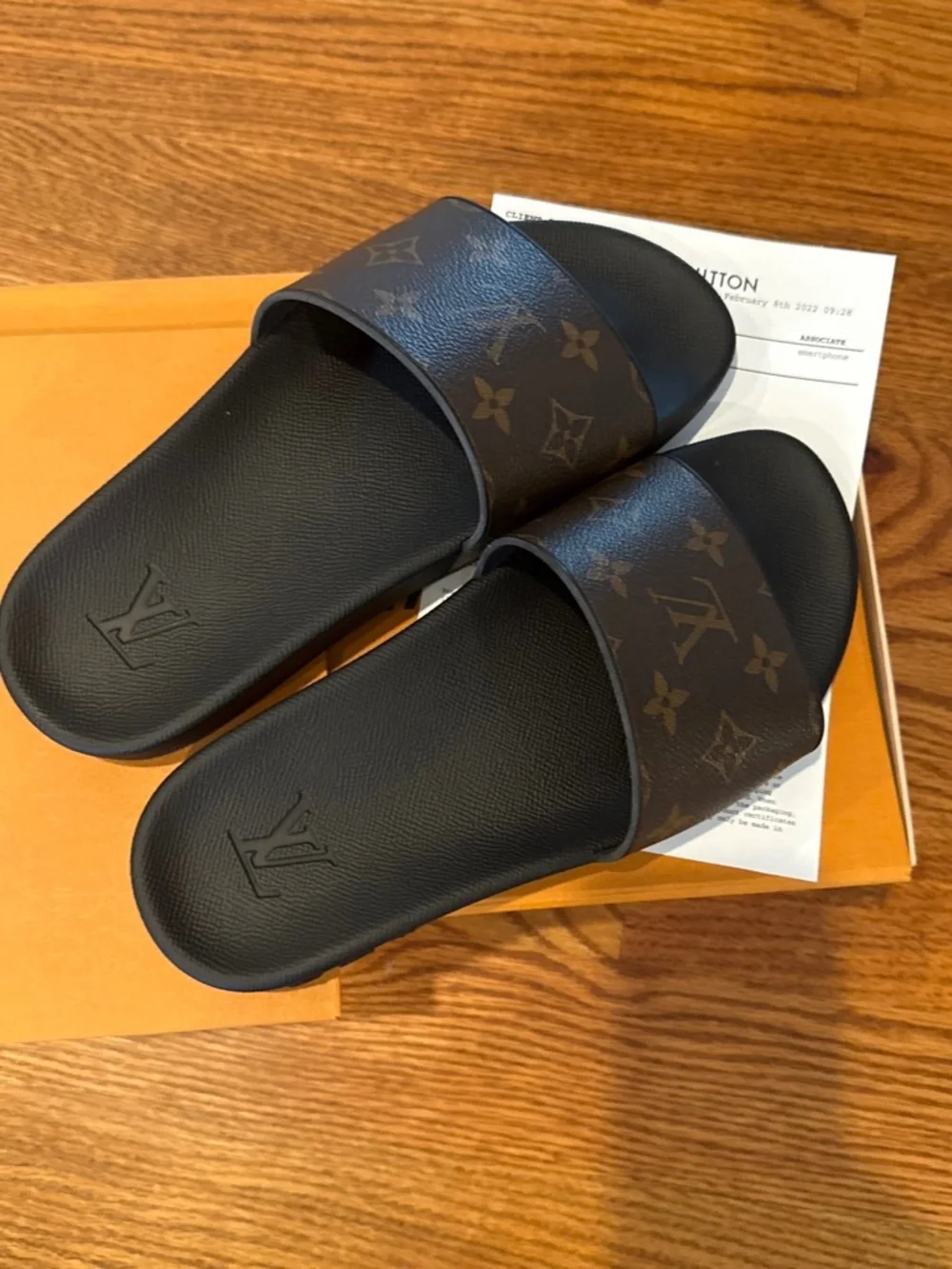 Louis Vuitton men’s size 6 water slides